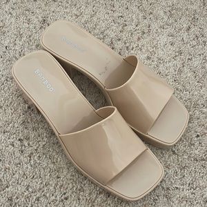 Nude sandals.
